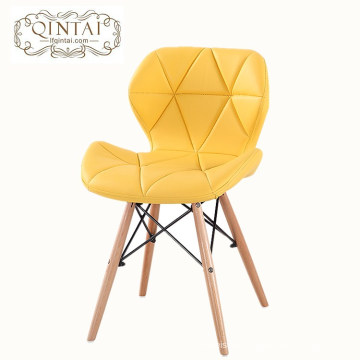 Wholesale luxury cheap Alibaba furniture Scandinavian look Nordic style yellow dining chair leather PU with wood beech legs